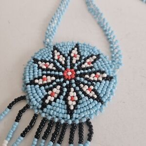 Native American seed bead medallion Star necklace Light Blue Leather Backing